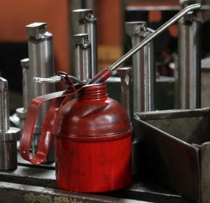close up of a red can with grease additives