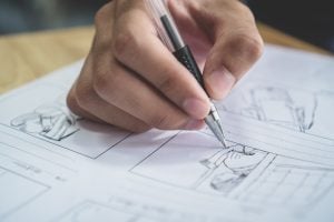 Storyboard or storytelling drawing creative for movie process pre-production media films script for video editors, Student hand writing graphic organizer in form of illustrations displayed in sequence