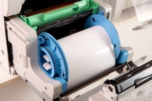 Used almost empty roll of photographic paper