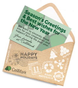 envelope with green seasons greetings card